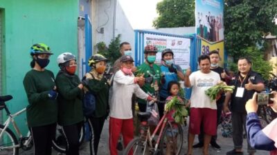 Aksi Sedekah Pangan Komunitas Sepeda Bersama PAM Pagesangan Surabaya